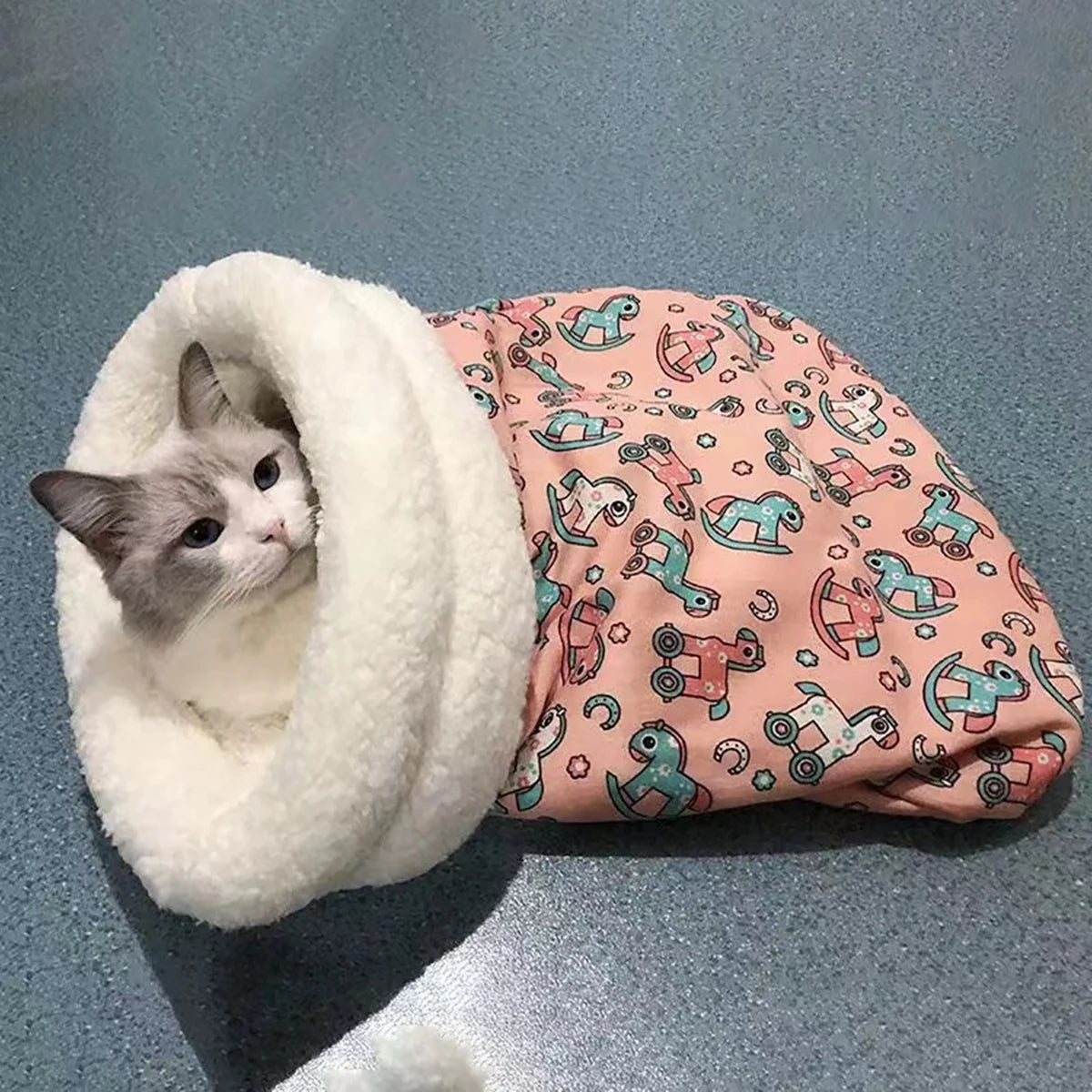 Fluffy pet sleeping bag for cats and small dogs